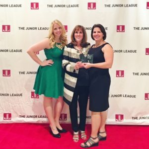 Meagan Avery (2017-18) and Karis Boerner (2016-17) JLD Presidents with AJLI President Carol Scott receiving award for 95 years of service